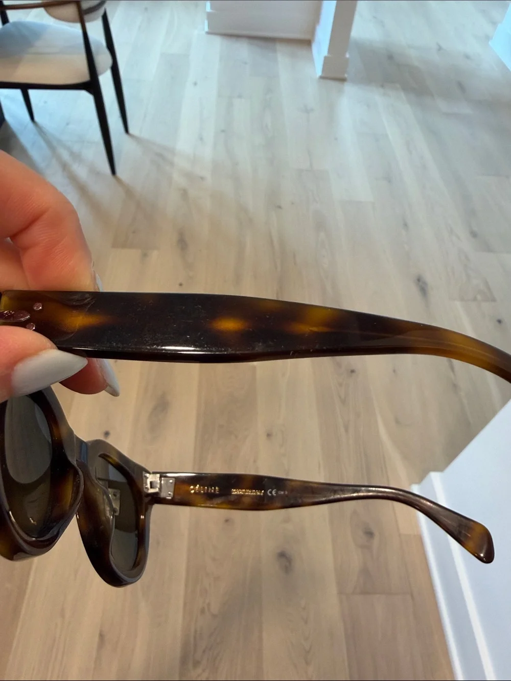 Celine sunglasses featuring
